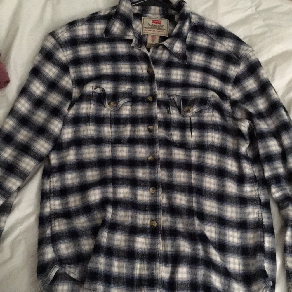 Levi’s blue, white, tan, and black women’ flannel.